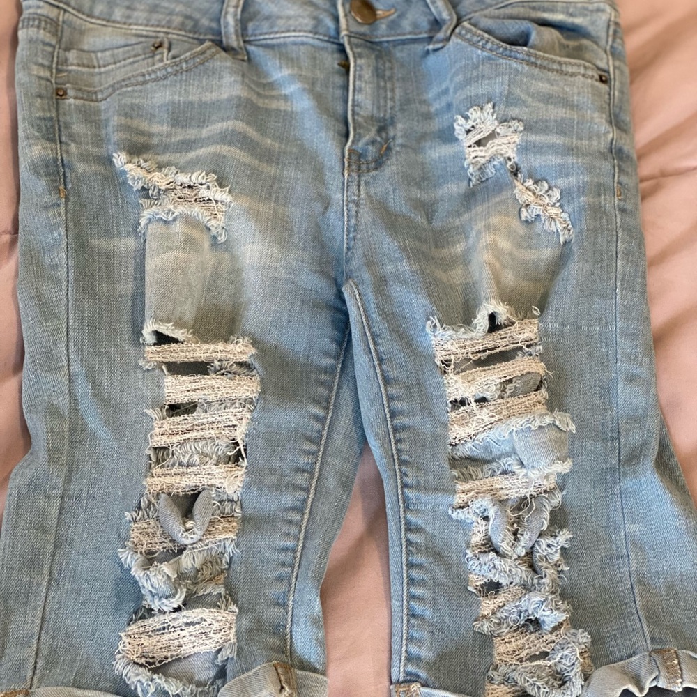 Blue distressed denim shorts